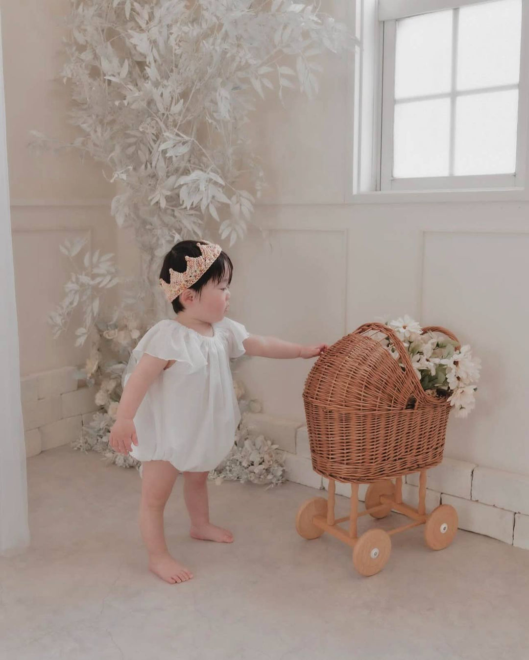 Wicker Pram with Knitted Blanket